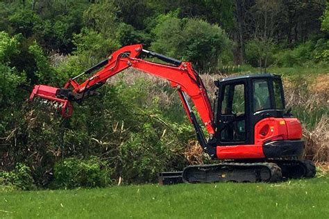 mini excavator bush hog|excavator with bush hog attachment.